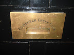 Caixa de correio na porta do Edinburgh Chess Club.